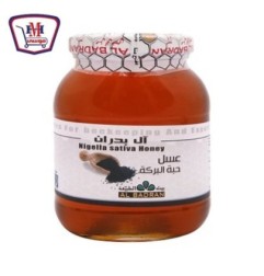 صورة البدران عسل ابيض زجاج بحبه البركه 1 كيلو جرام من البدران - هايبر موسى