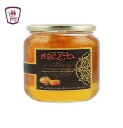 حاج عرفه عسل نحل بالشمع 500 جرام | من حاج عرفه | هايبر موسى — أفضل سعر